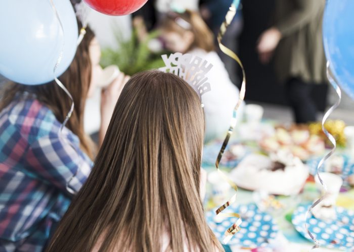 back-view-guests-birthday-party